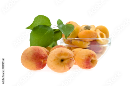 apricots lie a heap on a background a dish with apricots