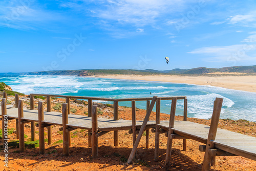 Walkway to Praia do Bordeira beach and beautiful blue sea view, Algarve region, Portugal