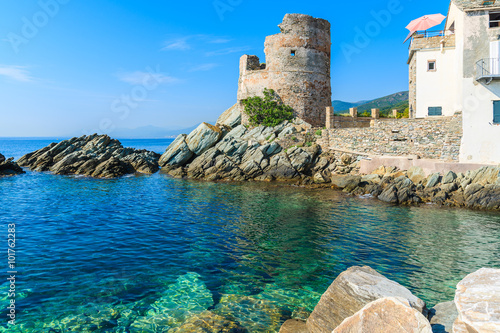 Medieval tower on coast of Corsica island in Erbalunga town, France