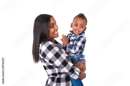 African American mother holding her little son isolated on whit