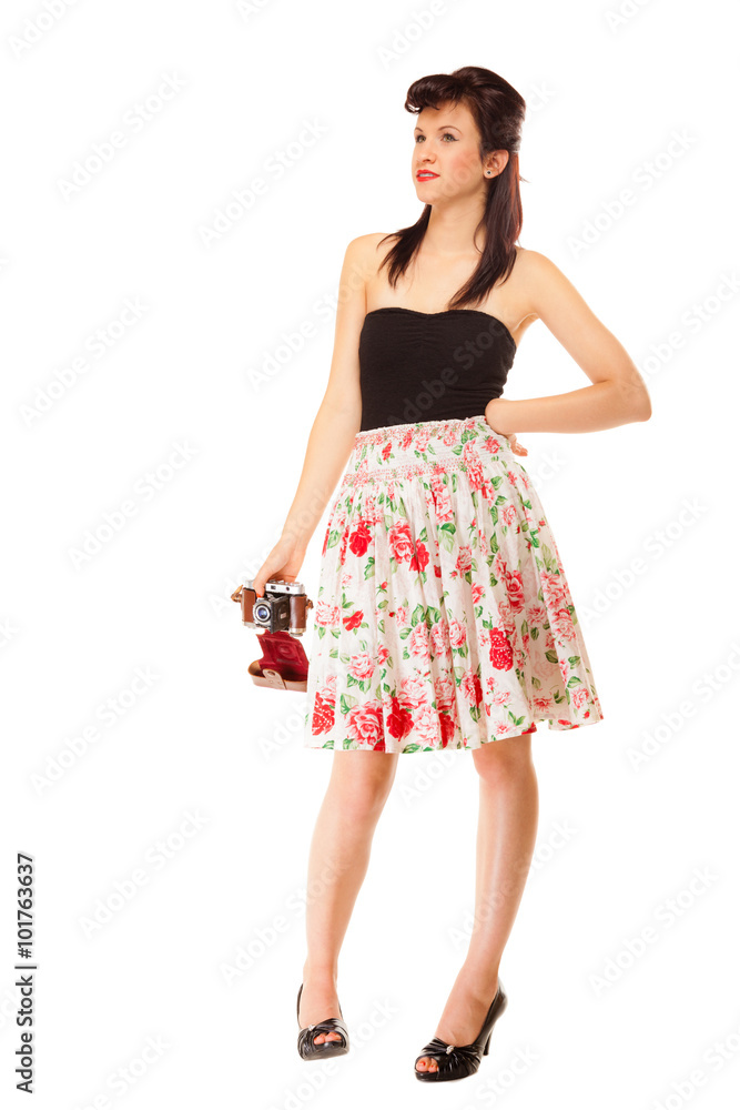 Teen girl with old camera