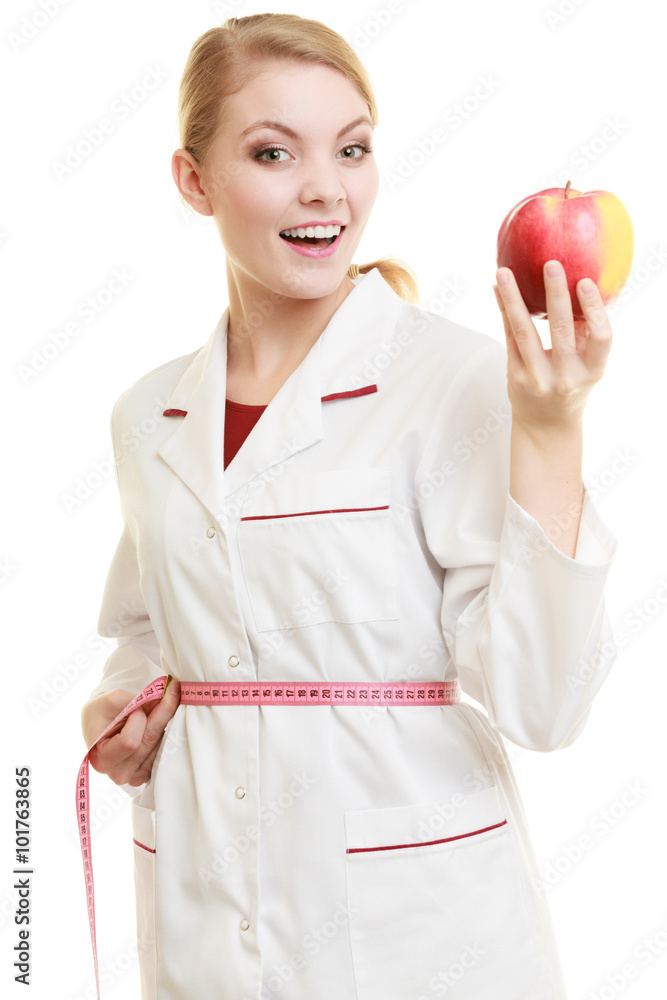 Doctor specialist holding fruit apple measuring waist Doctor specialist holding fruit apple measuring waist