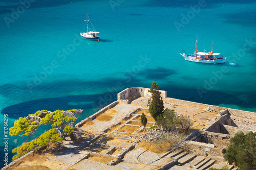 two ships in the bay near the island of Spinalonga photo
