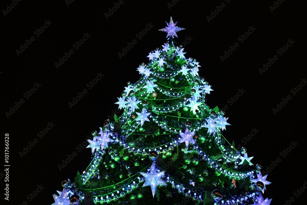 decorated with baubles and garlands Christmas tree decorated with baubles and garlands Christmas tree