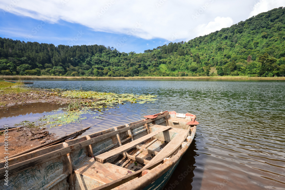 Beautiful landscape of the Laguna Verde with a boat, in Apaneca, Ruta de Las Flores itinerary, El Salvador
