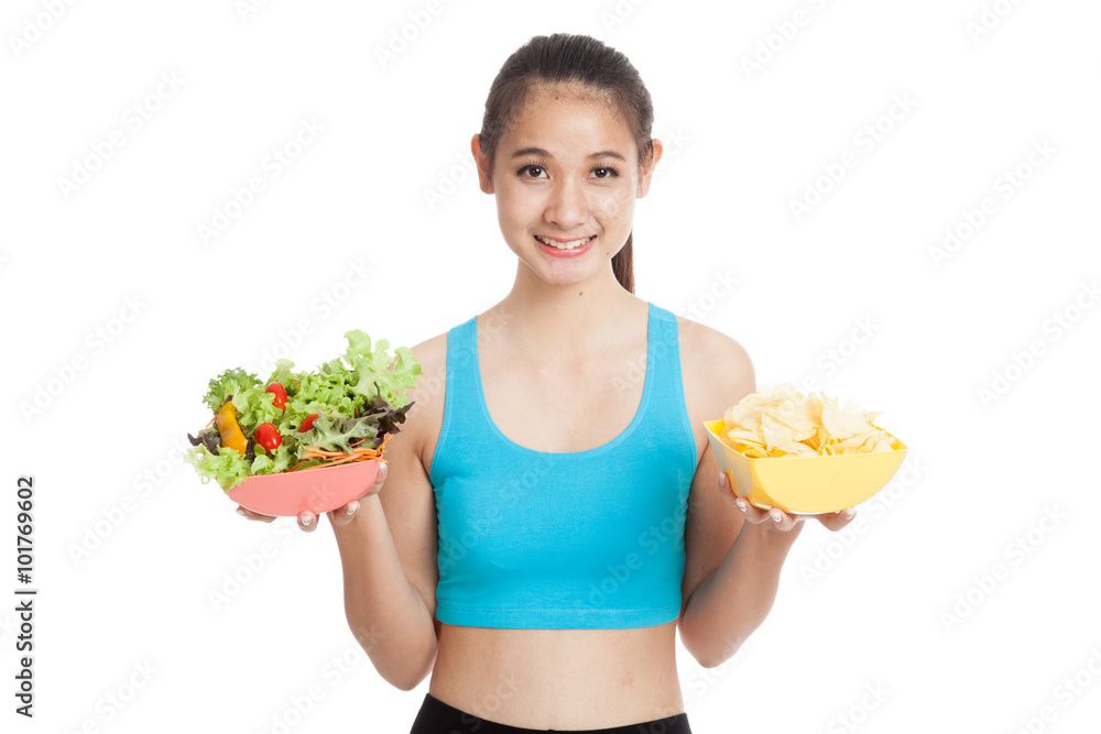 Beautiful Asian healthy girl salad and potato chips Beautiful Asian healthy girl salad and potato chips