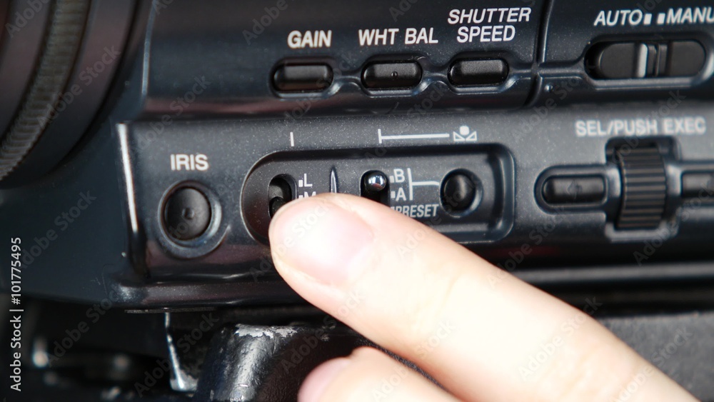 Finger pressing the button on camera, change, close up Finger pressing the button on camera, change, close up