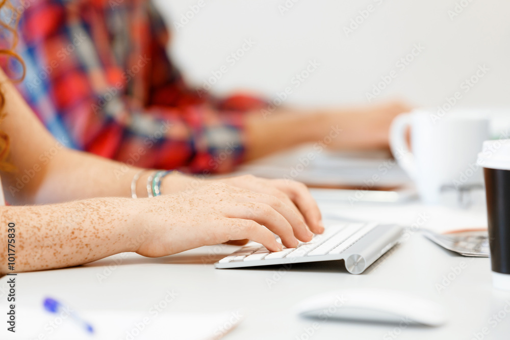 Hands typing on the keyboard Hands typing on the keyboard