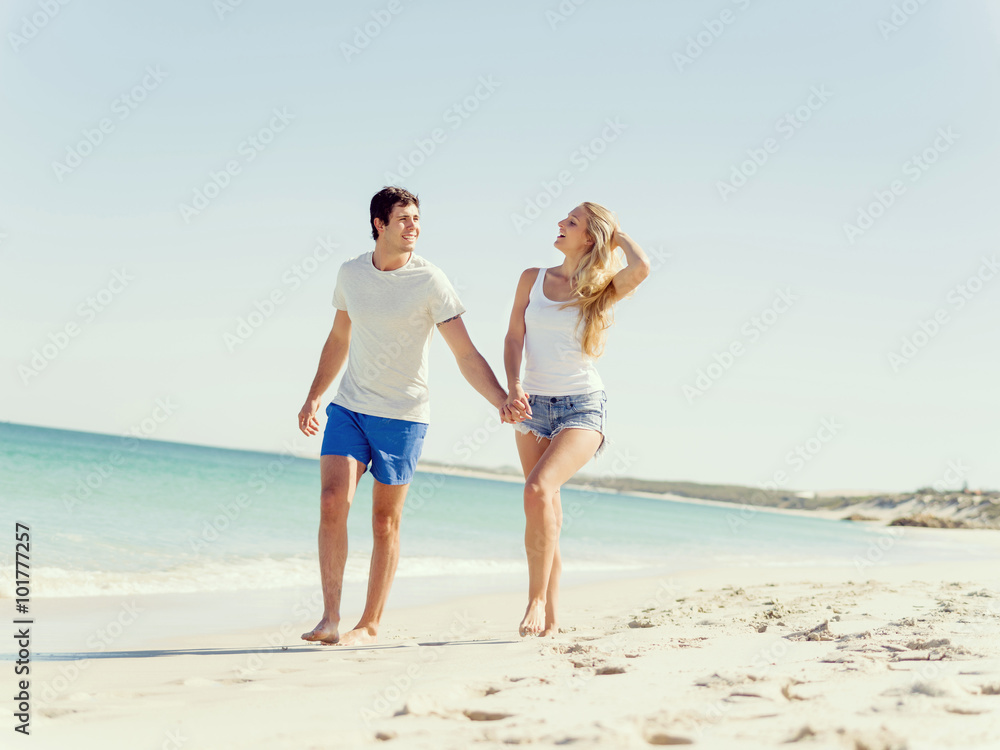 Romantic young couple on the beach Romantic young couple on the beach