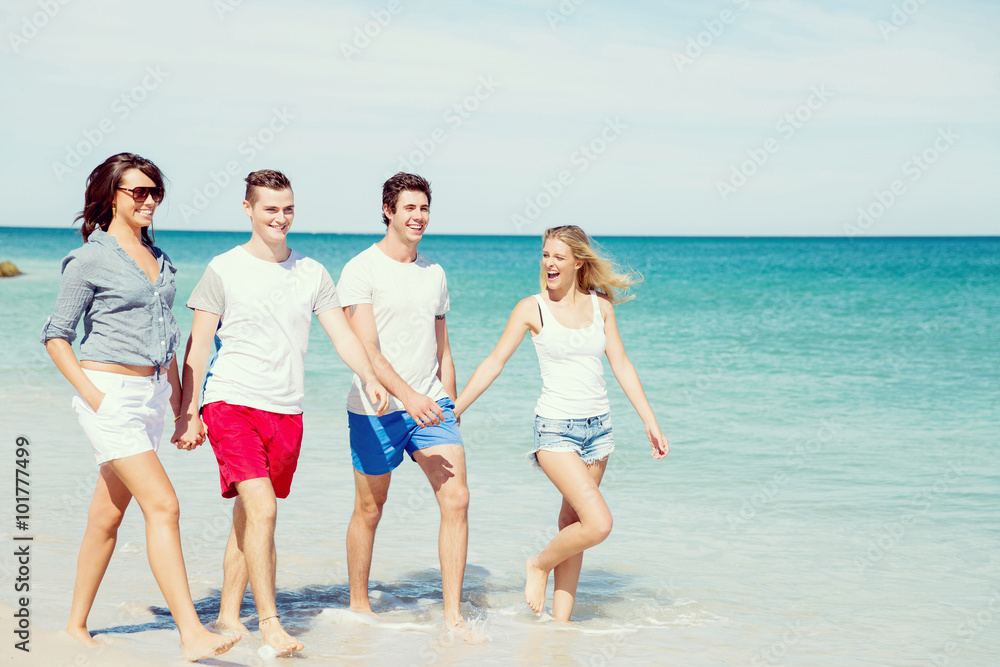 Company of young people on the beach Company of young people on the beach