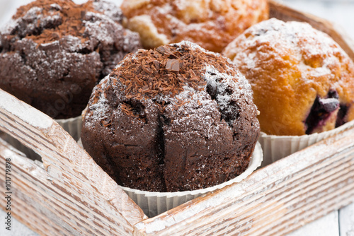 assortment of fresh delicious muffins, closeup