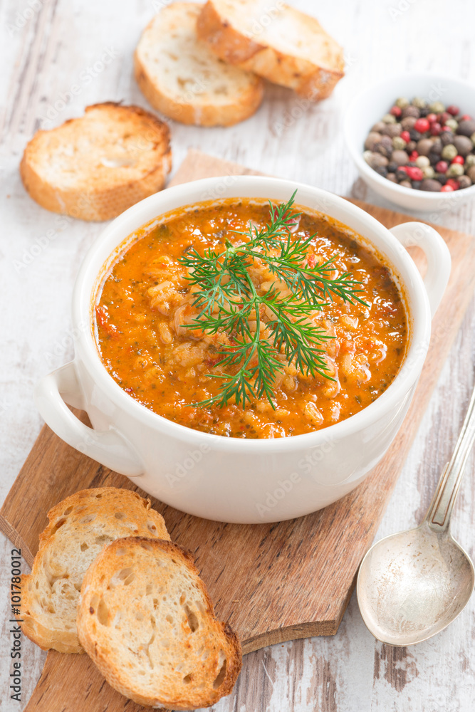 tomato soup with rice, vegetables and bread, vertical tomato soup with rice, vegetables and bread, vertical
