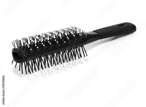 Massage round hairbrush isolated on white background