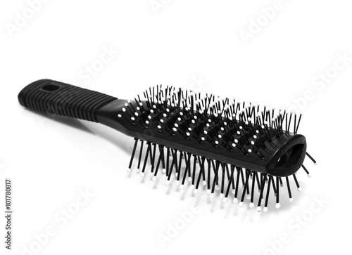 Massage round hairbrush isolated on white background