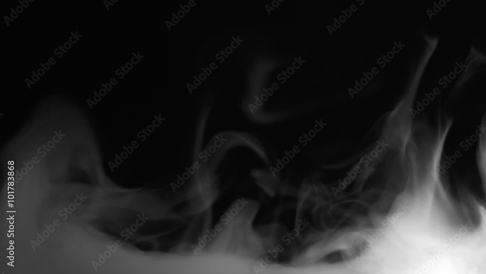Real white steam looking like smoke isolated on black background. Clouds of fantasy smoke abstract magic mystic fog toxic gas fumes pollution. Real speed motion. Camera locked down. Real white steam looking like smoke isolated on black background. Clouds of fantasy smoke abstract magic mystic fog toxic gas fumes pollution. Real speed motion. Camera locked down.
