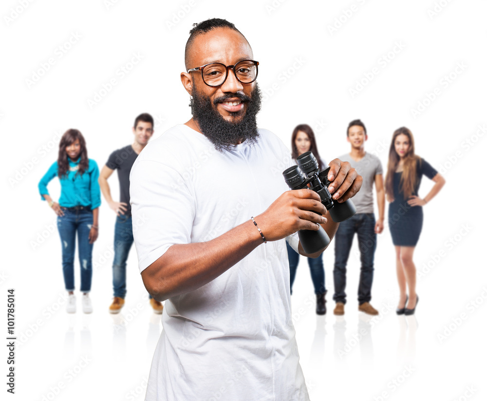 black man looking through a binoculars black man looking through a binoculars