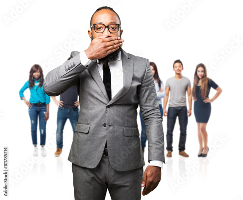 business black man covering his face