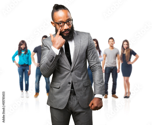 business black man pointing his eye