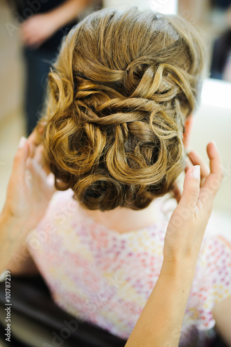 bride get a professional hair style