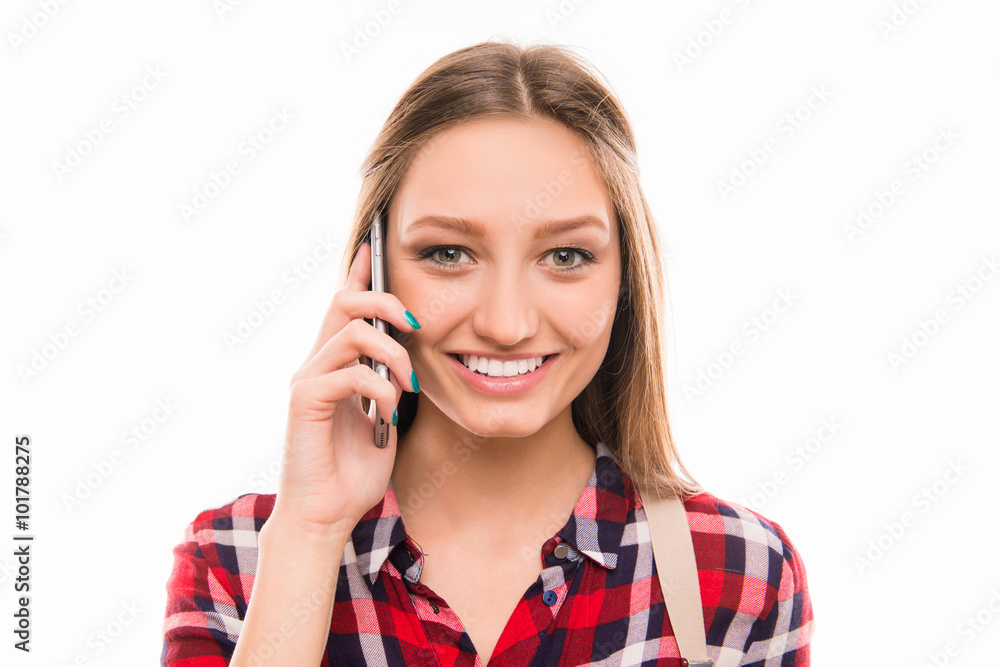 Cheerful cute young pretty girl speaking on mobile phone Cheerful cute young pretty girl speaking on mobile phone