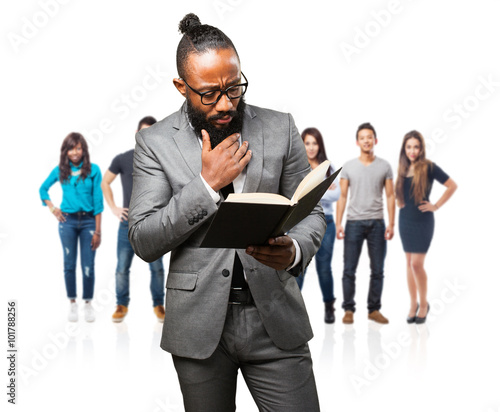 business black man holding a book