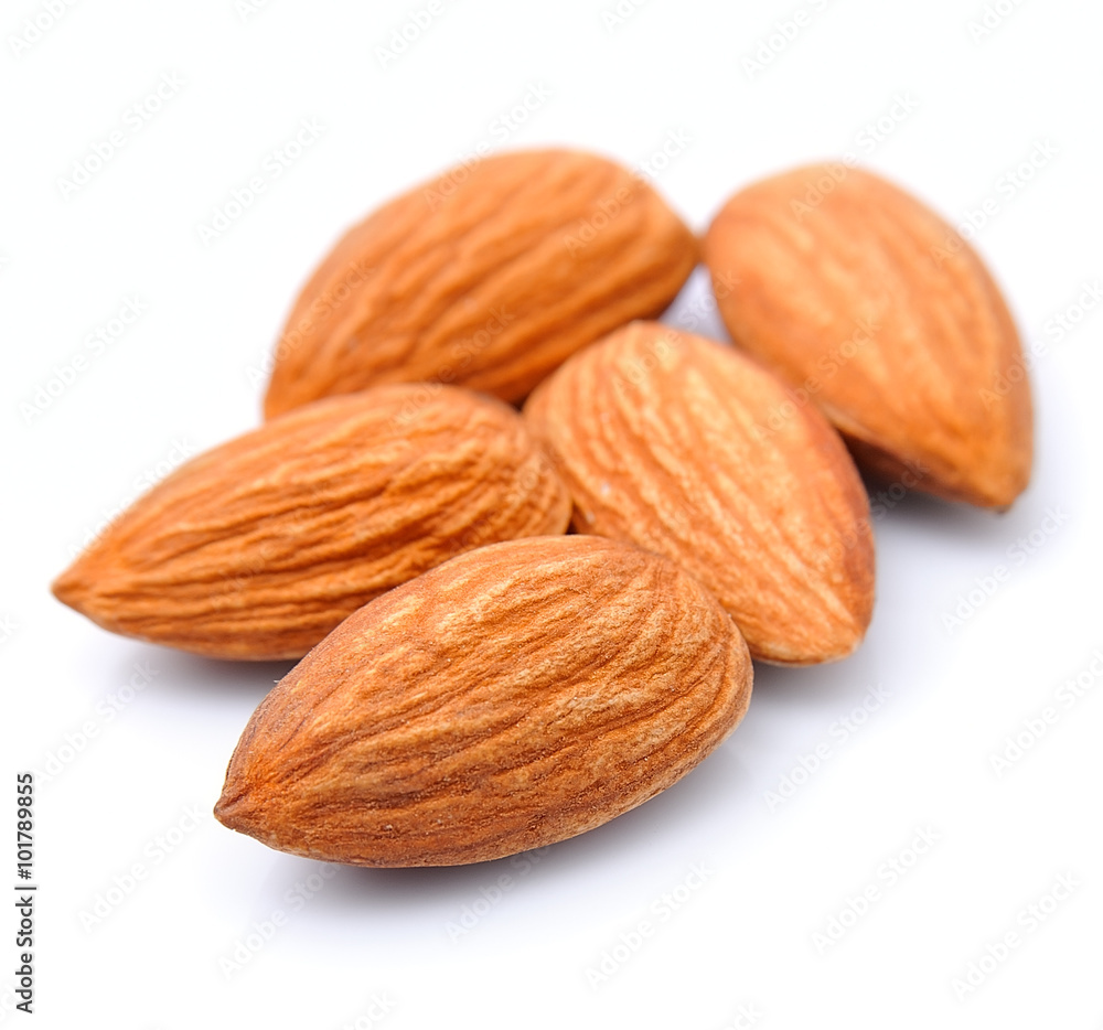 Almonds close up on the white Almonds close up on the white
