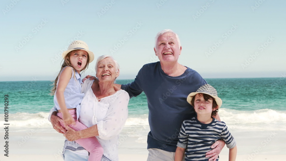 Young kids with grandparents standing Young kids with grandparents standing