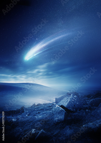 Fototapeta Naklejka Na Ścianę i Meble -  A bright comet with large dust and gas trails as it gets close to the Sun on a misty evening. Illustration.