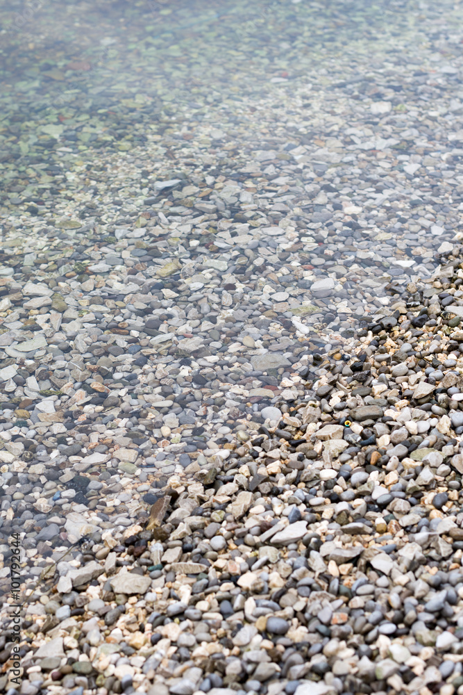 Litle rocks on the sea beach