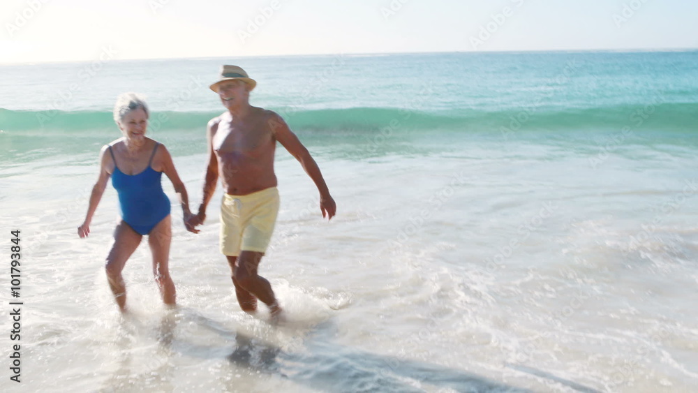 Old retired couple in the sea Old retired couple in the sea