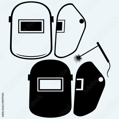 Protective welding mask helmet. Isolated on blue background. Vector silhouettes