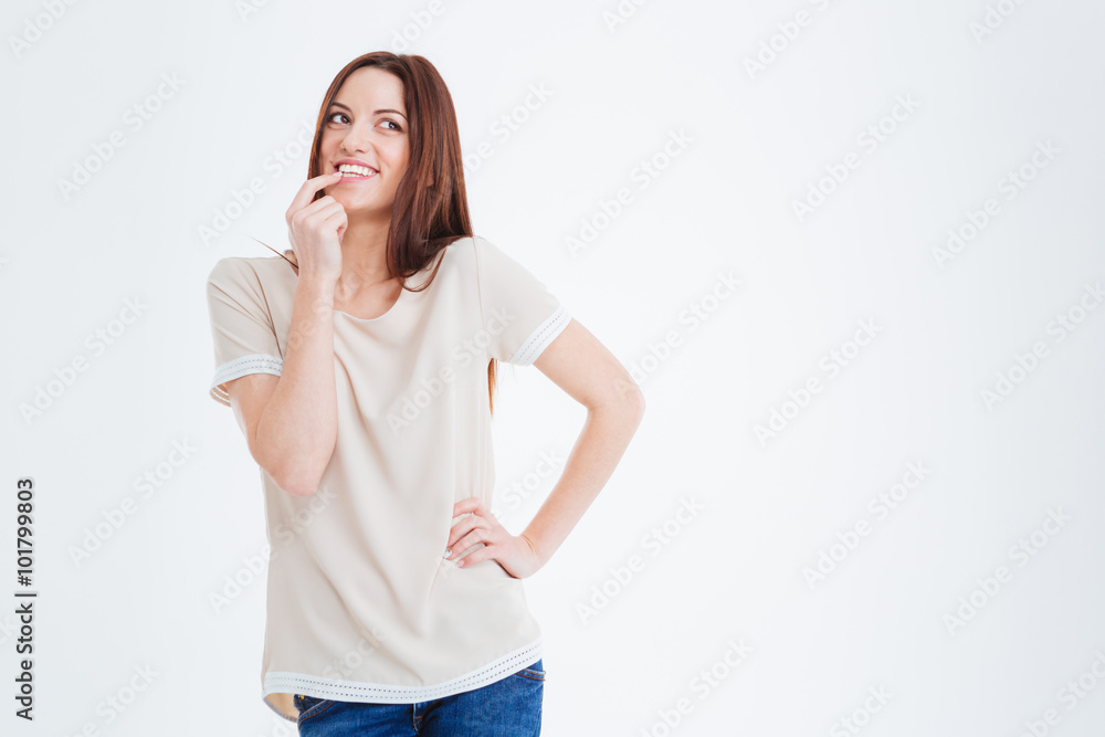 Happy charming young woman smiling and thinking Happy charming young woman smiling and thinking