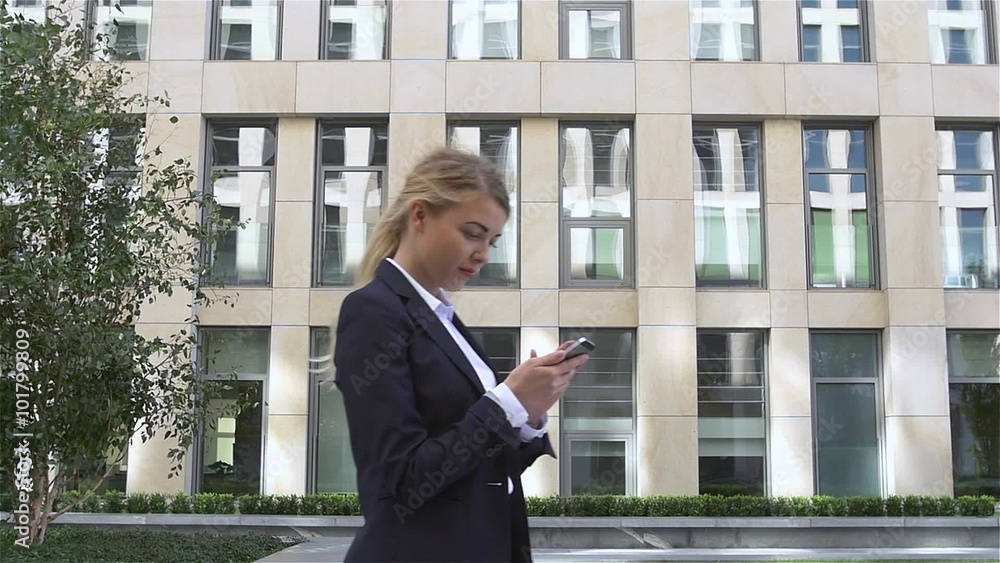 smiling businesswoman with hands up. very emotional blonde, slow motion smiling businesswoman with hands up. very emotional blonde, slow motion