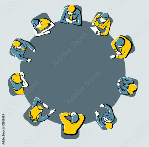 Colorful meeting table with business people working on office

