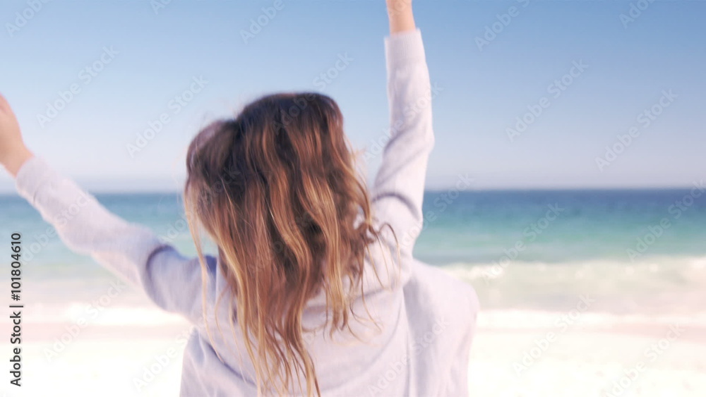 Little girl jumping in the sand Little girl jumping in the sand