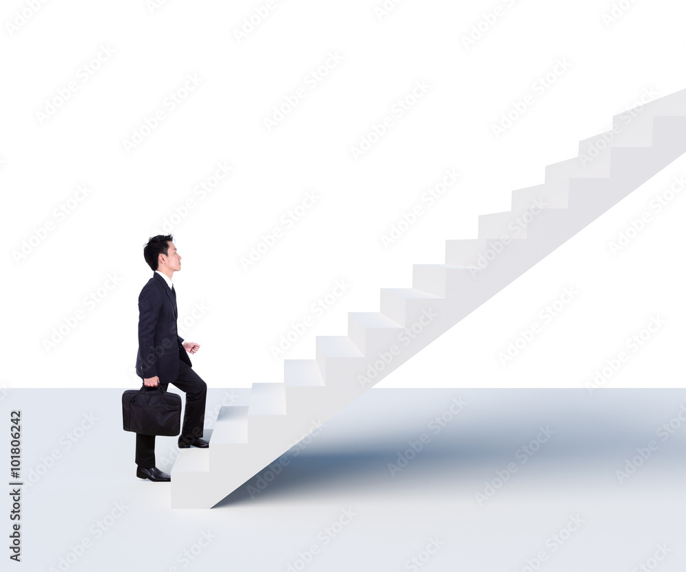 Business man stepping up on stairs Business man stepping up on stairs