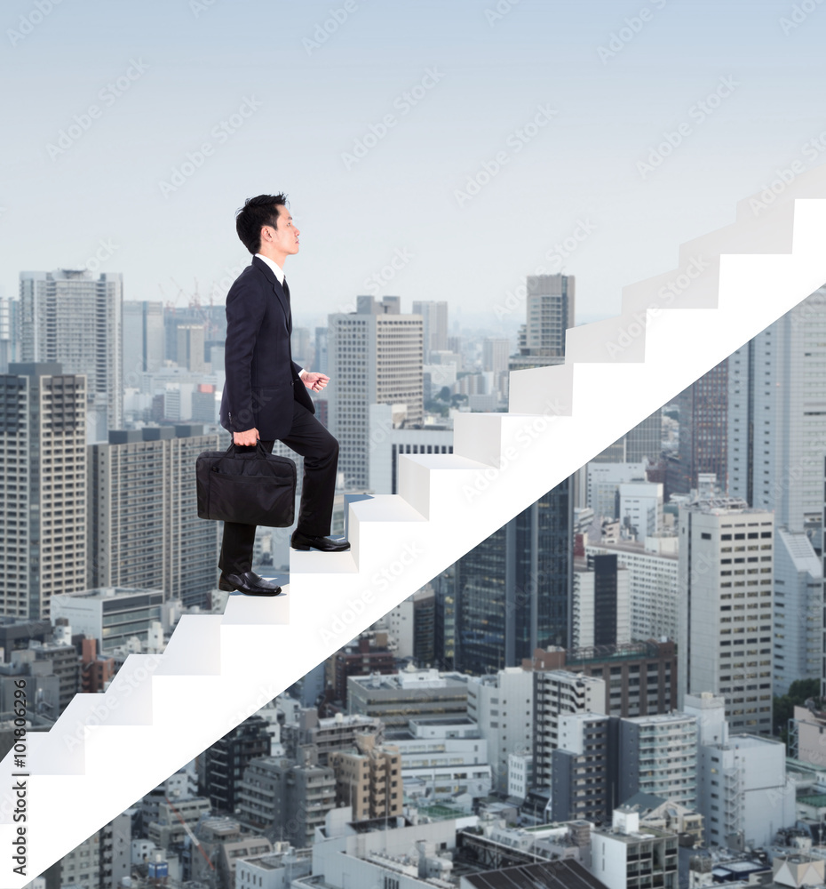Business man stepping up on stairs with city background