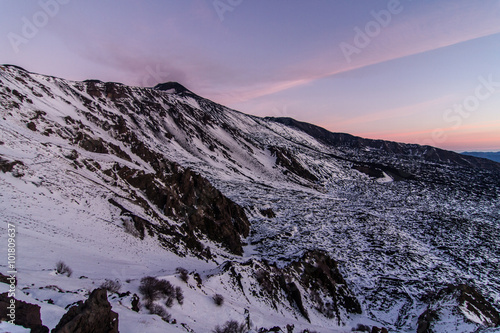 "Valle del Bove" sunrise. Etna volcano with snow