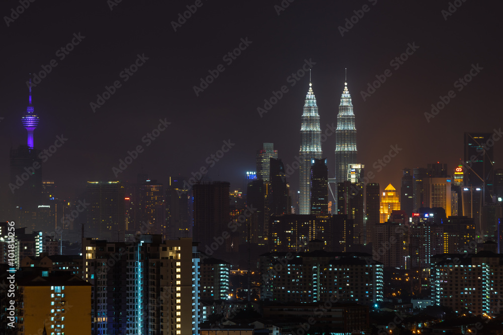 KUALA LUMPUR, MALAYSIA - 31ST DECEMBER 2015; Kuala Lumpur, the capital of Malaysia. Its modern skyline is dominated by the 451m-tall KLCC, a pair of glass-and-steel-clad skyscrapers.