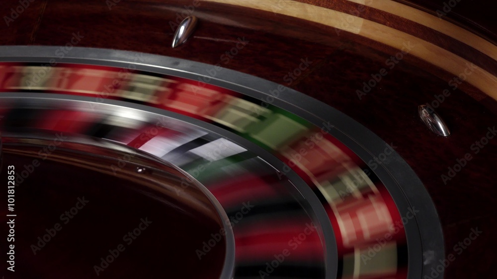 One part of roulette wheel running, white ball falls One part of roulette wheel running, white ball falls