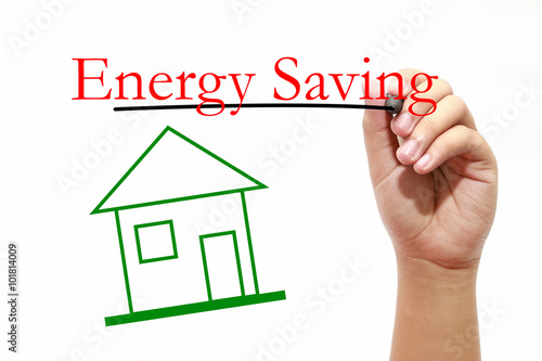 Energy Saving - House with text and male hand with pen photo