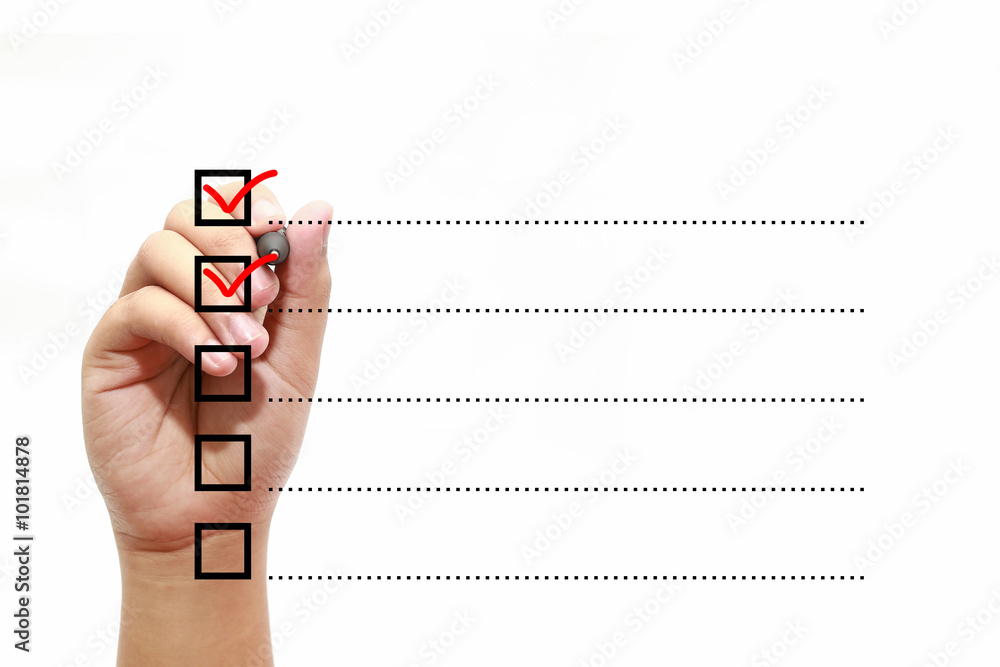 Fotografie Businessman checking mark on checklist with marker over white