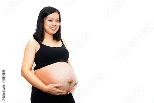 Pregnant asian woman isolated on white background.