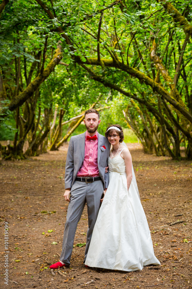 Bride and Groom in Orchard Portrait