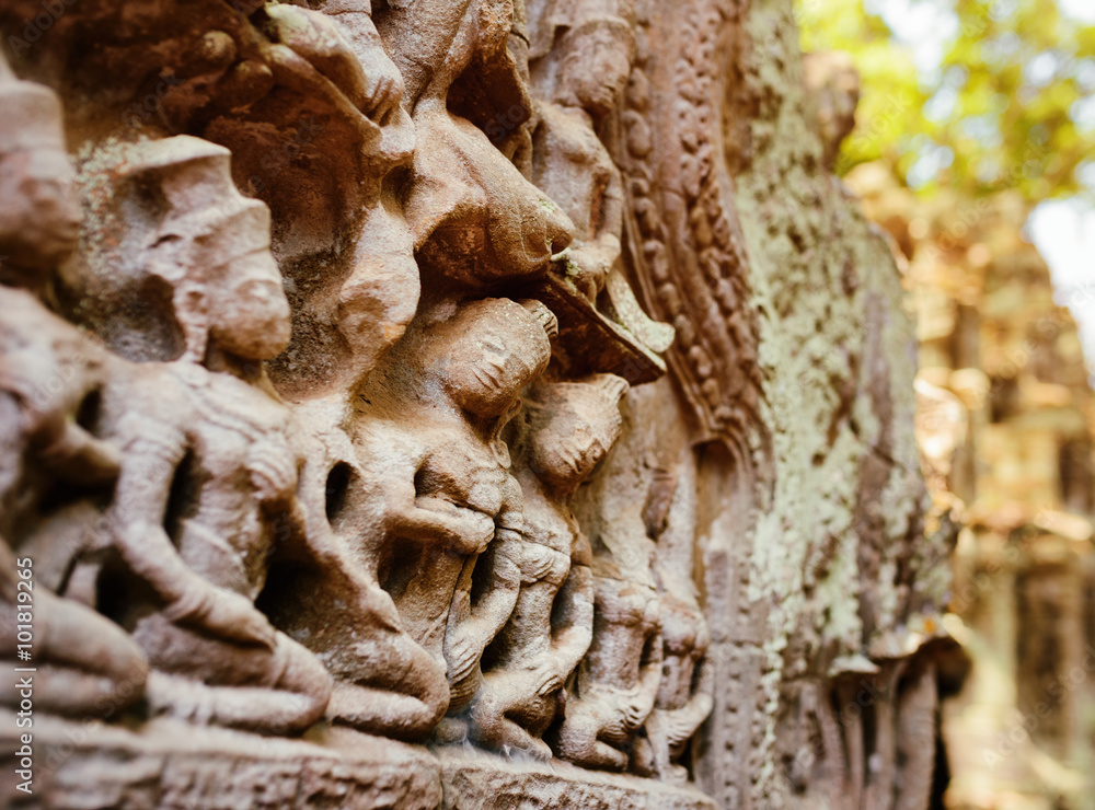 Ancient bas-relief at Ta Prohm temple in Angkor, Cambodia Ancient bas-relief at Ta Prohm temple in Angkor, Cambodia