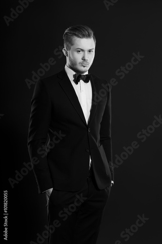 Studio portrait of a fashion young man wearing a suit