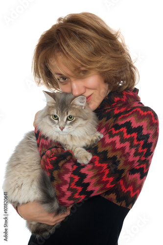 Young woman hugging a cat