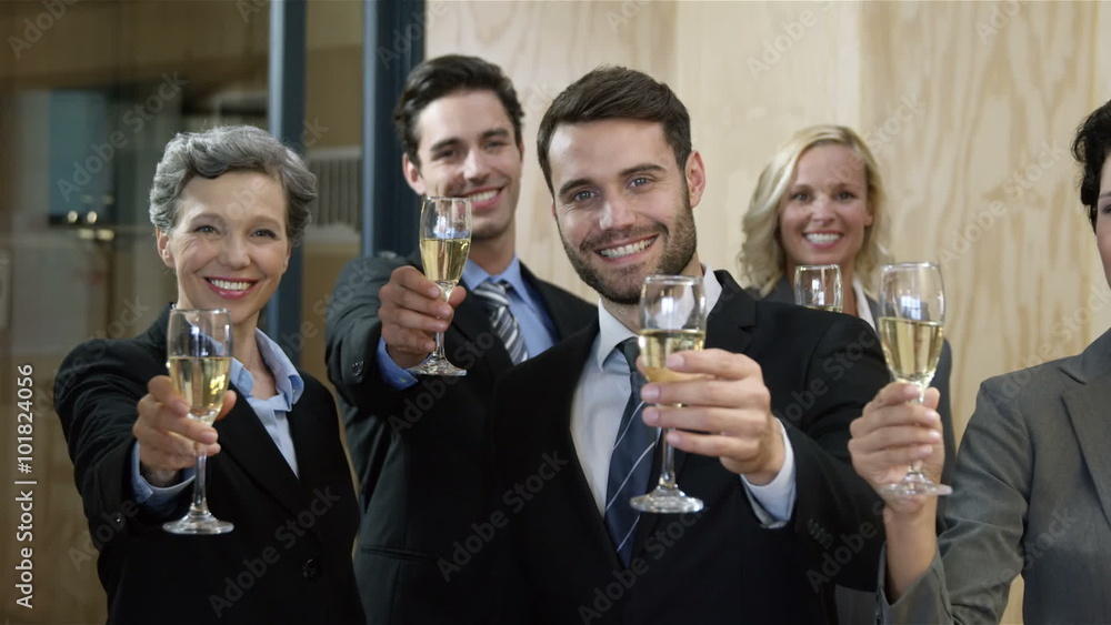Business people toasting with champagne Business people toasting with champagne