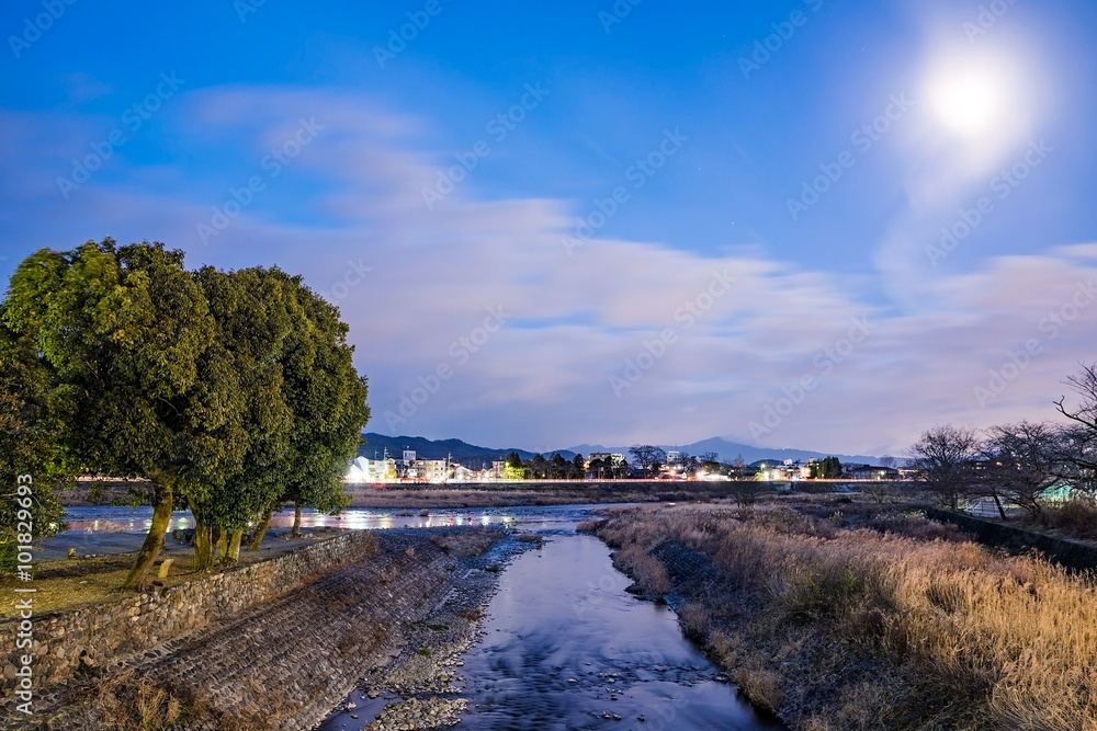 Stream at night in Kyoto with moonlight