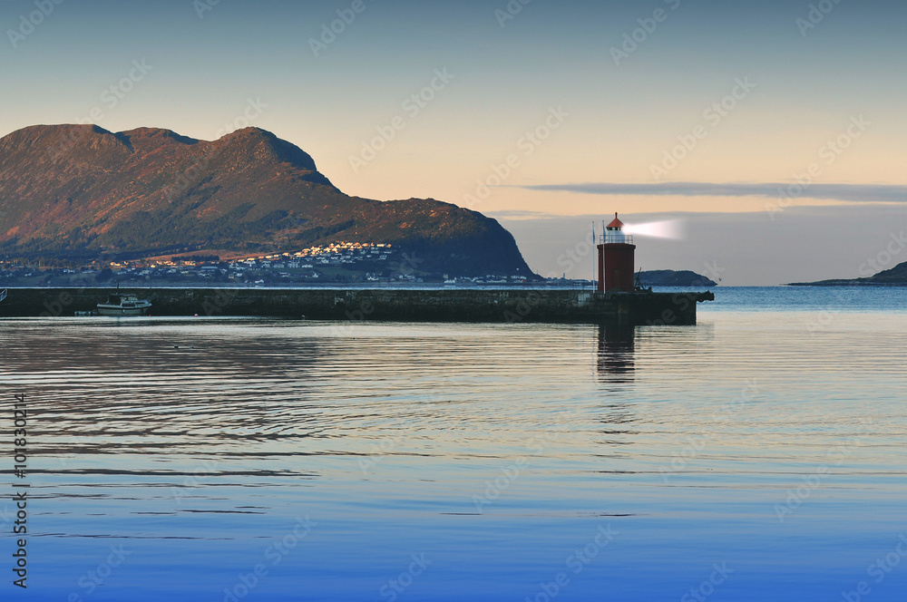 Old lighthouse on sea coast in Alesund - Norway
